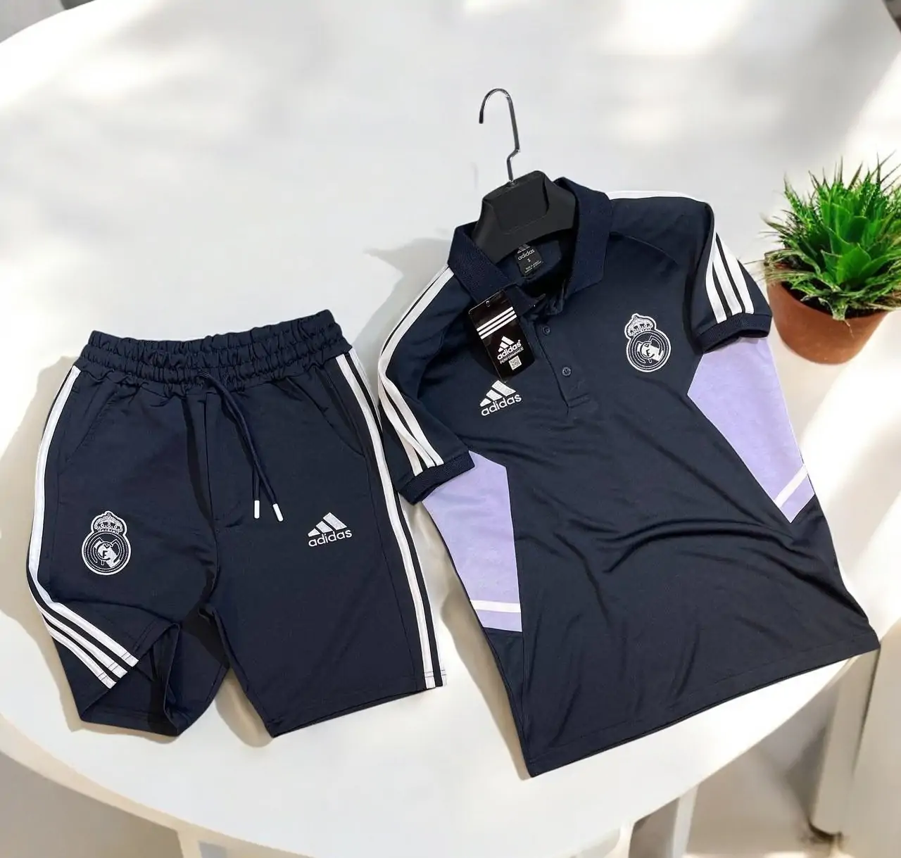 ⁦طقم ريال مدريد أزرق عاتم⁩ - الصورة ⁦3⁩