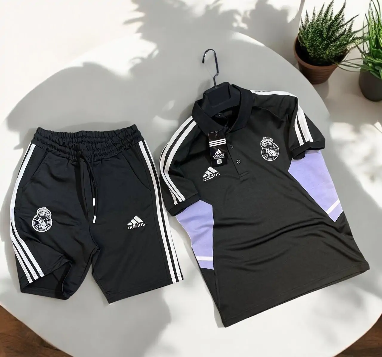 ⁦طقم ريال مدريد لون أسود⁩ - الصورة ⁦2⁩